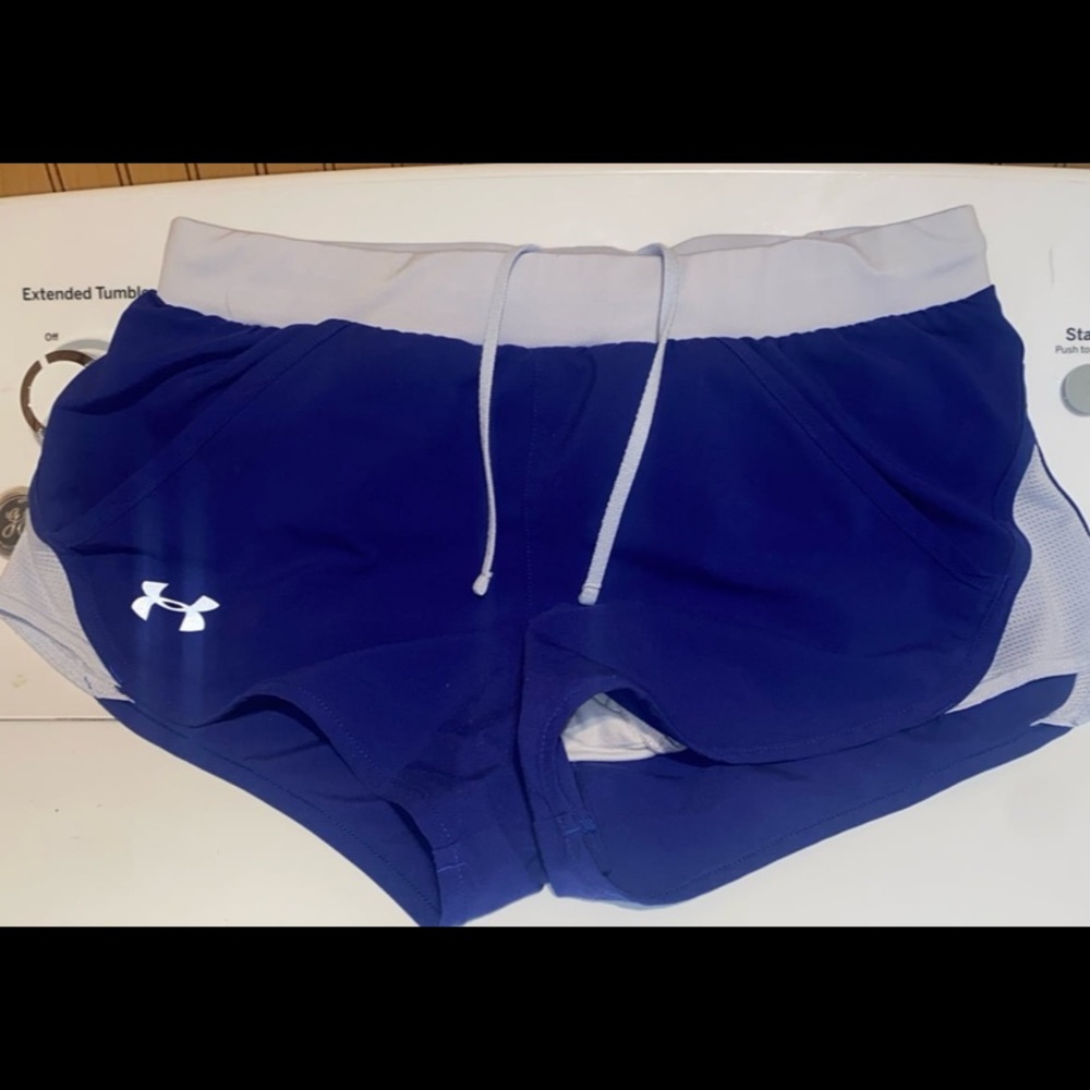 Woman’s UA shorts